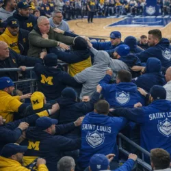BREAKING: Pre-Game Violence Mars Michigan-St. Louis Clash; Father of Star Hospitalized